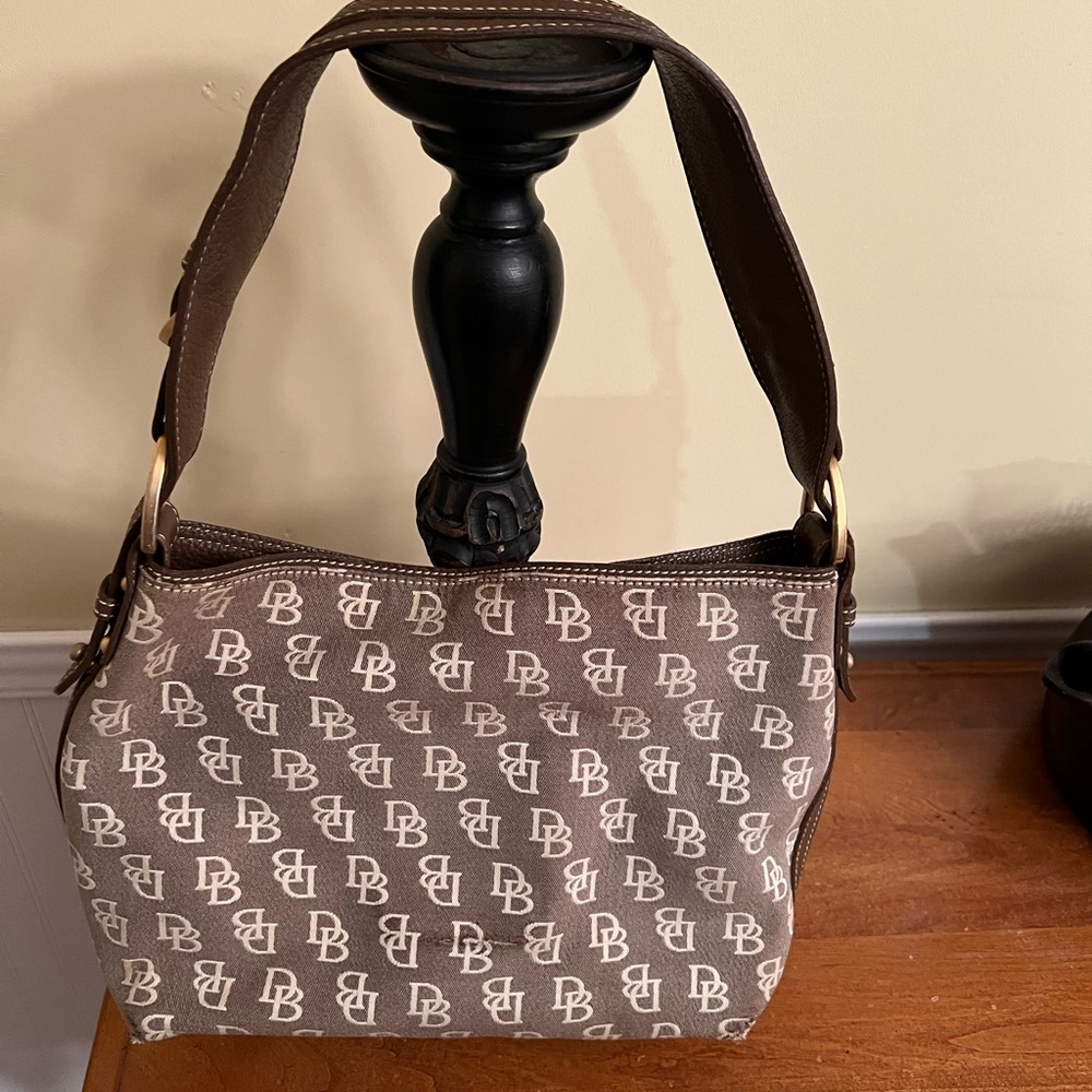 Used light brown and tan Dooney and Burke bag